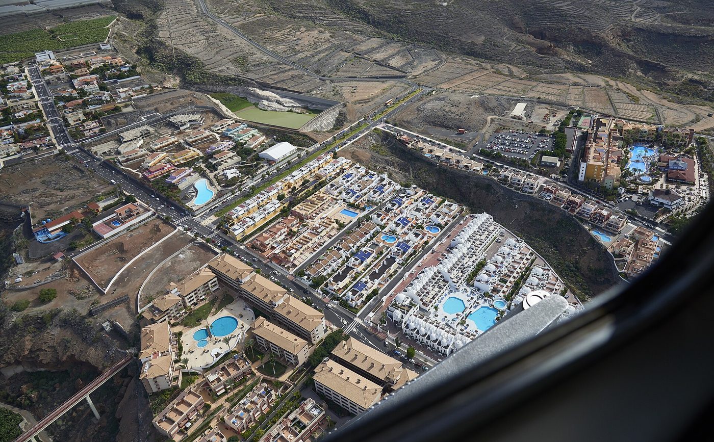 Apartments and hotels among the old farm terraces