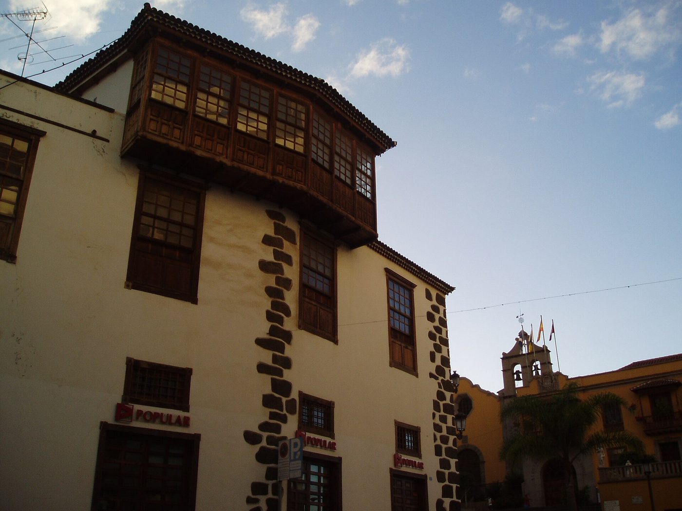 A house with a wooden balcony in the old town