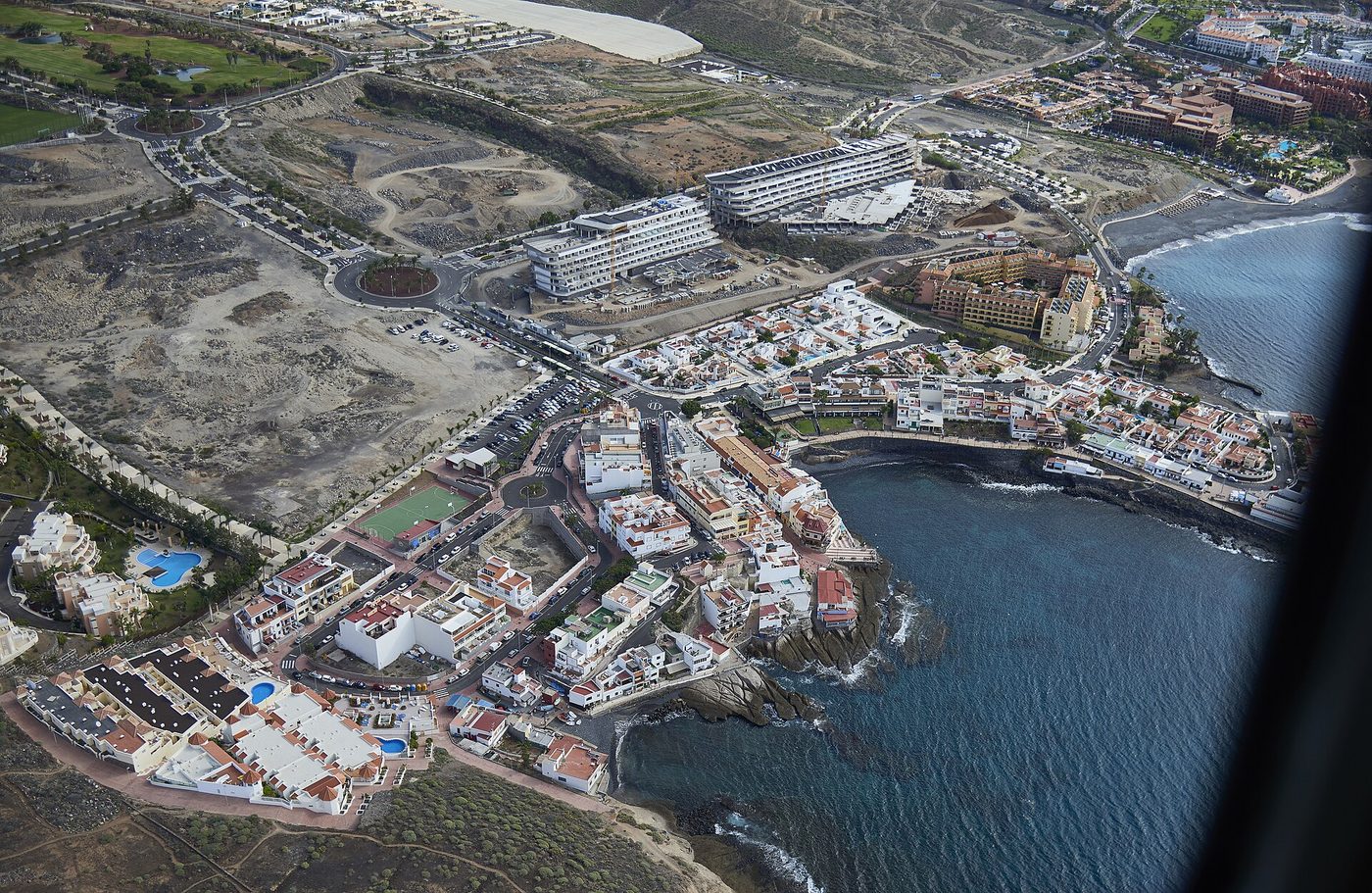 La Caleta from the air, between the old village and the new resorts